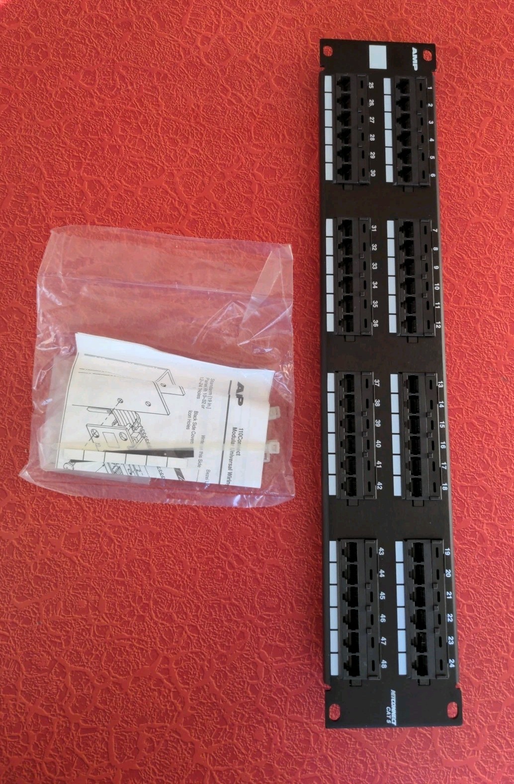 AMP NETCONNECT 406331-1 RJ45 Cat 5 48-Port Patch Panel, 110Connect, Black, 2U
