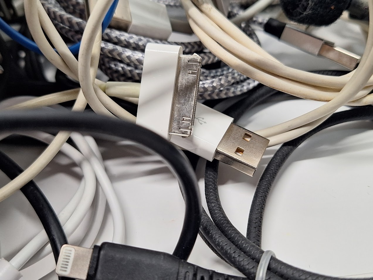 Lot of 60 Assorted Cables and Small Electronics