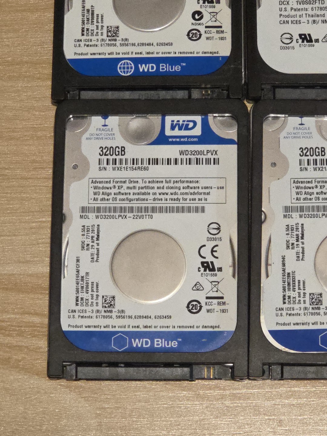 LOT 4 Western Digital WD3200LPVX 320GB 5400RPM 2.5″ SATA 3.0Gb/s Hard Drives HDD