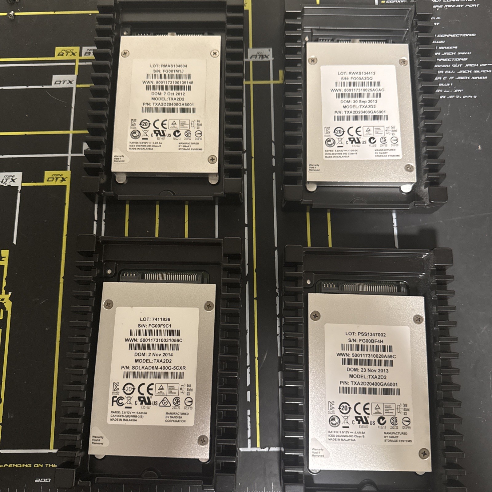 4x SanDisk TXA2D2 400 GB,Internal,2.5″ SSDs W/ IcePack SAS Heatsink