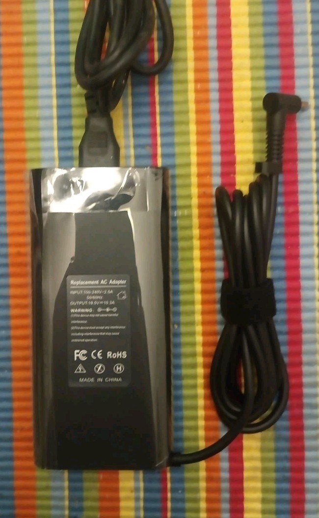 19.5V-10.3A Replacement AC Adapter From China Fits Various Laptops (See Photos)