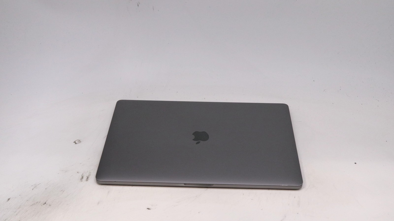 Apple Macbook Pro 15″ i9-9980HK 16GB 512GB CHP KBD – Good READ DESC