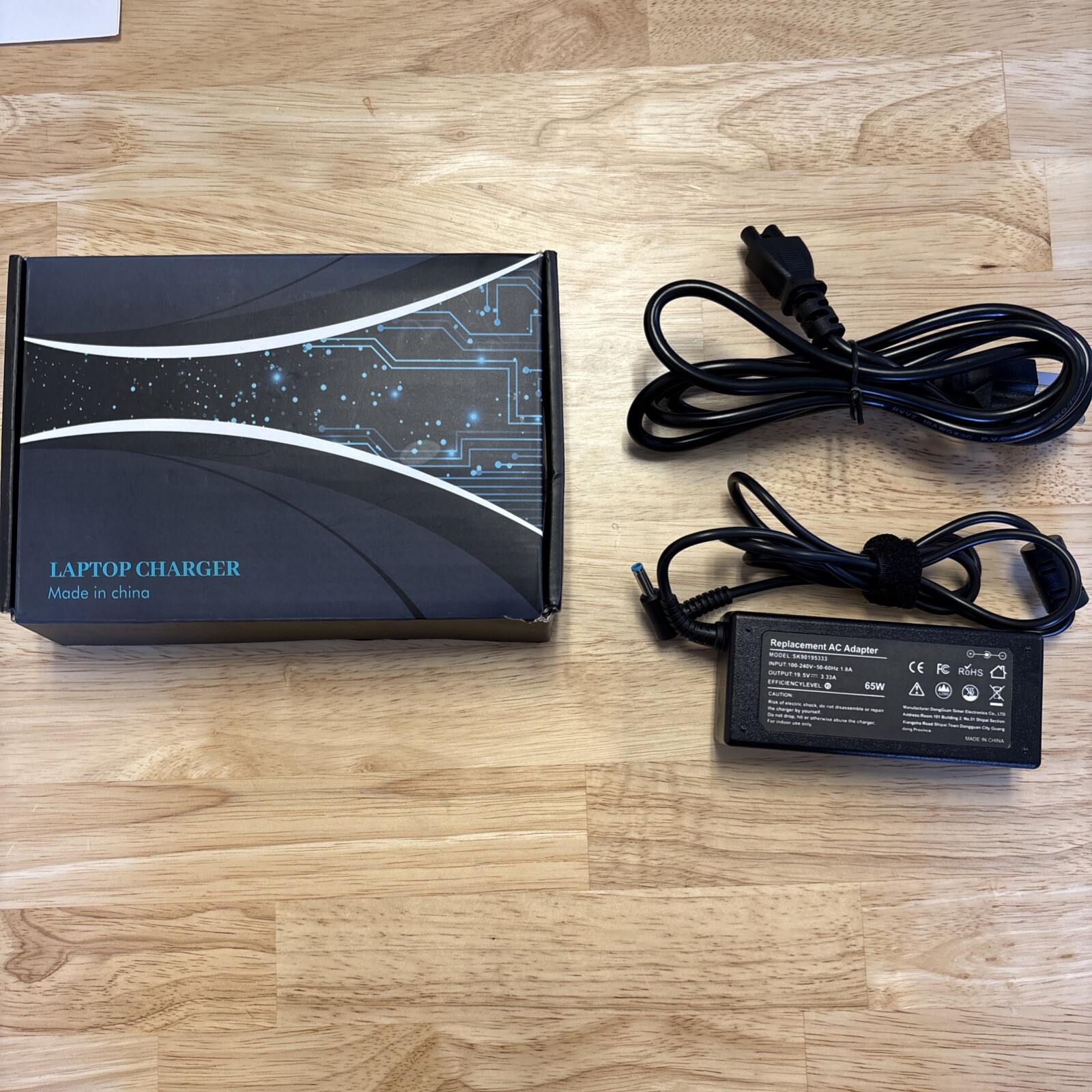AC Input: 100-240V 50-60Hz, Output: DC 19.5V 3.33A 65W Blue Tip Laptop Charger