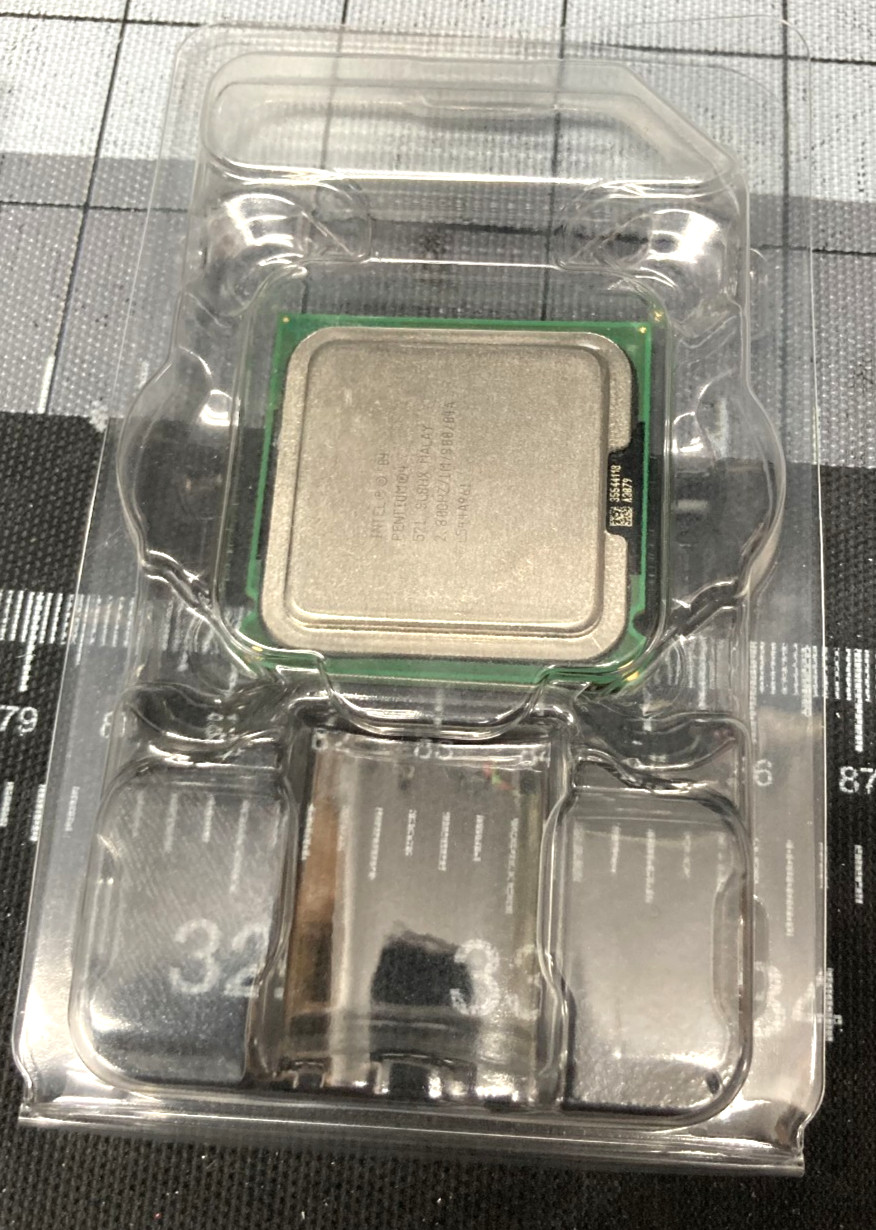 Intel Pentium 4 – 2.8Ghz w/ CPU Cooler, PCI Network Card, DDR2 RAM and Extras