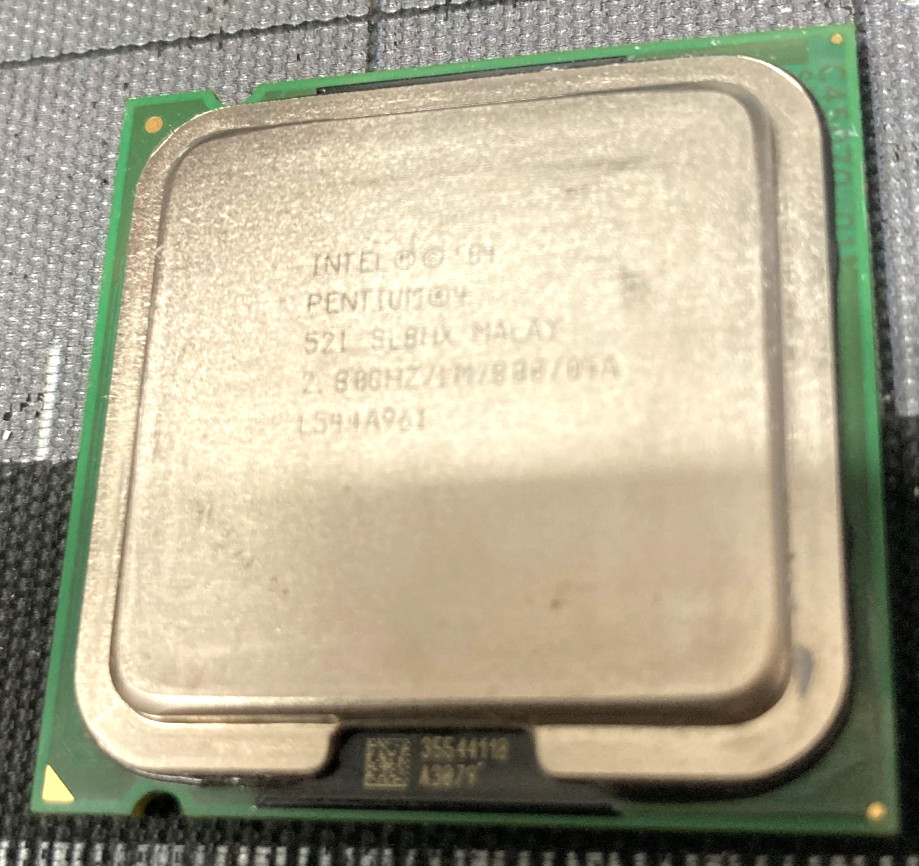 Intel Pentium 4 – 2.8Ghz w/ CPU Cooler, PCI Network Card, DDR2 RAM and Extras