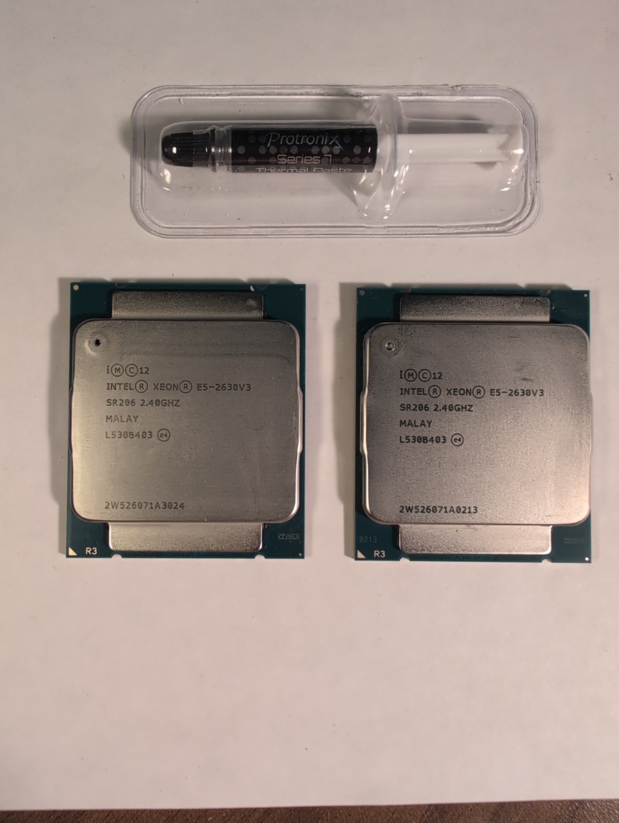 Matched pair Intel Xeon E5-2630 V3 2.40GHZ 8-Core 20MB LGA 2011-3 SR206