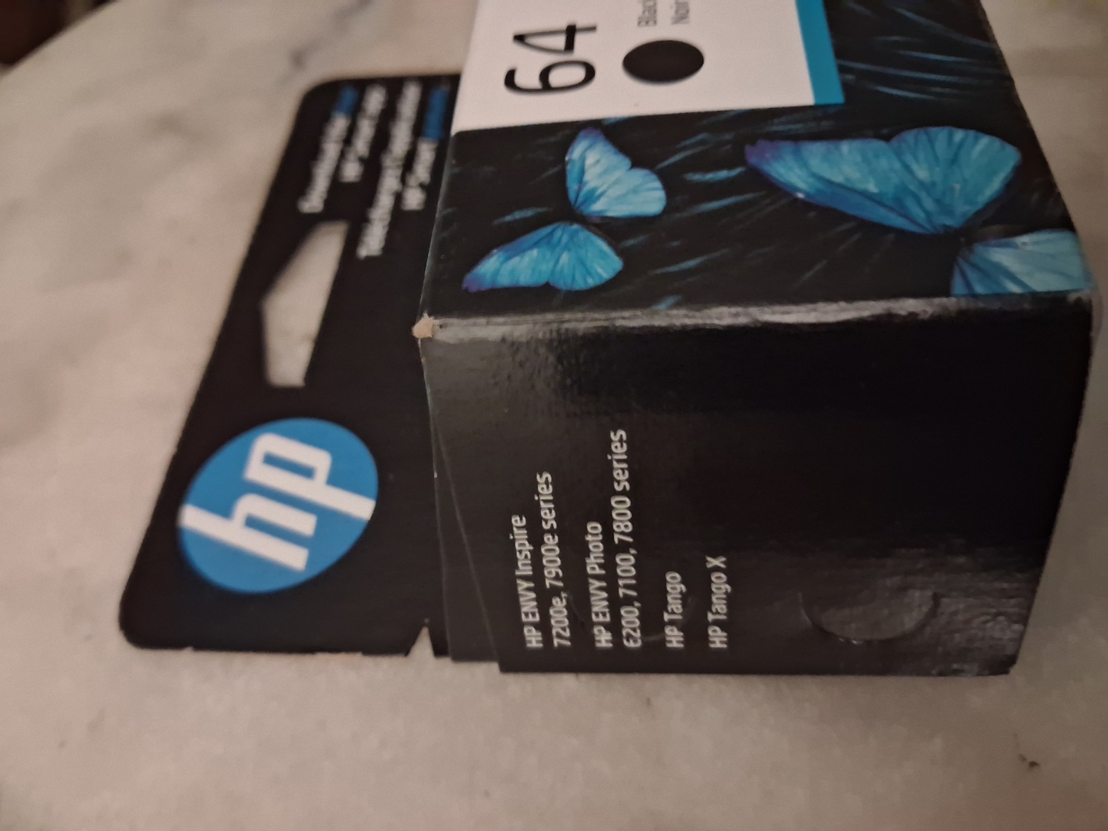 This is an HP 64 Black Original Ink Cartridge (N9J90AN).