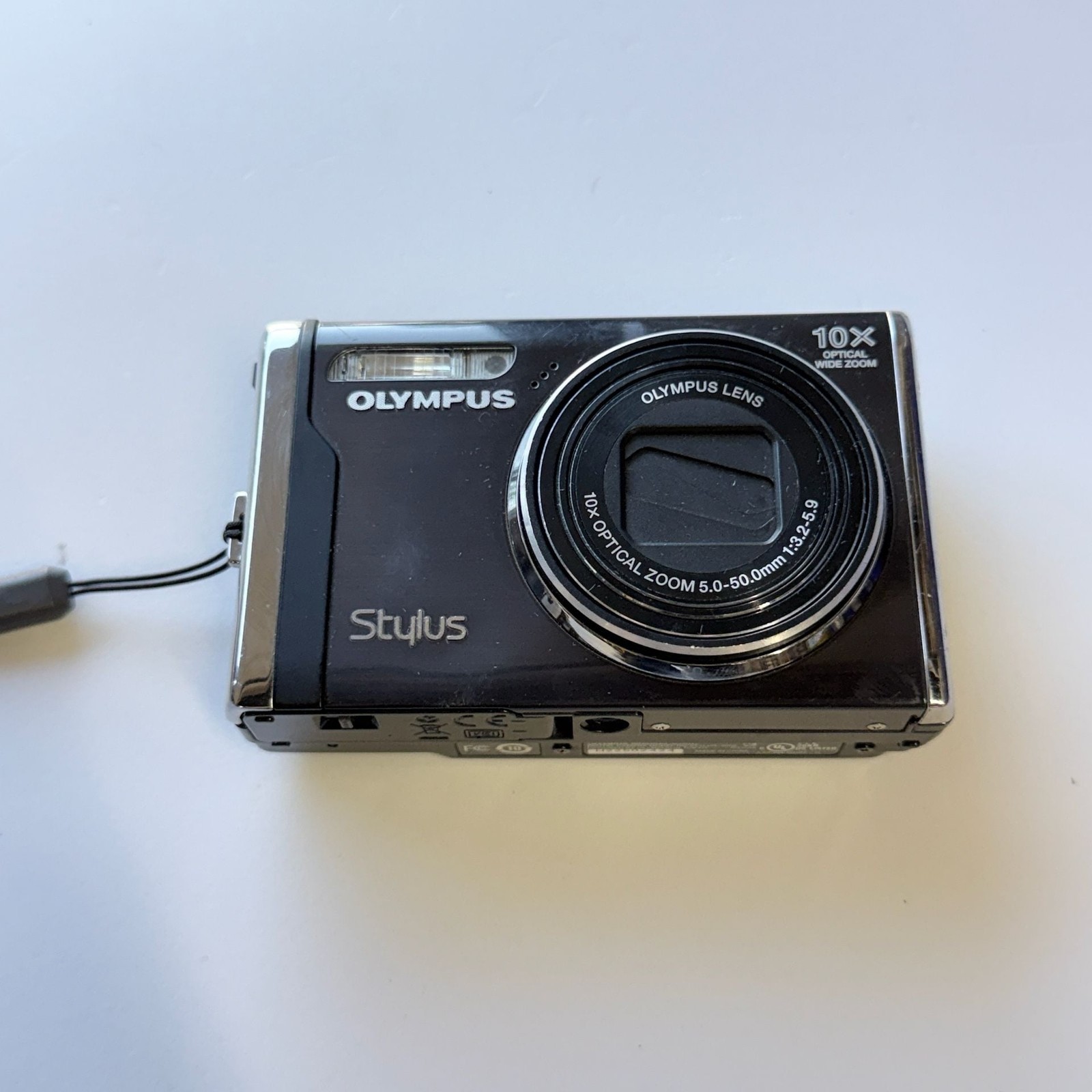 Olympus Stylus 9000 12MP Digital Camera with 10x Optical Dual Image Stabilized Z