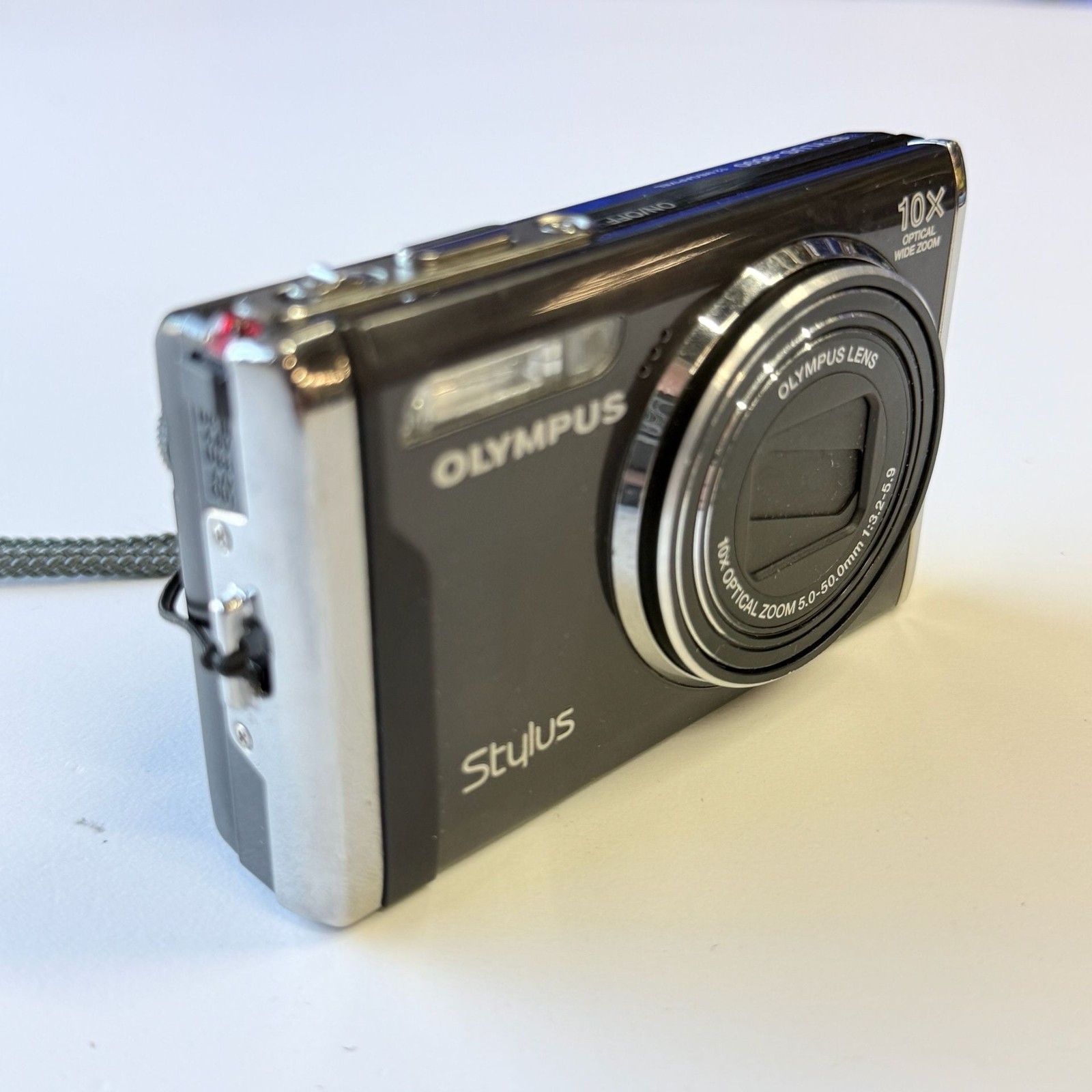 Olympus Stylus 9000 12MP Digital Camera with 10x Optical Dual Image Stabilized Z