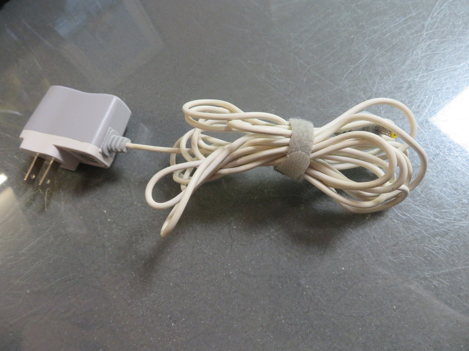 NYKO AC/DC Adapter Model # SCP0500500P Output: 5 VDC 500mA INput:120 vac 60HZ
