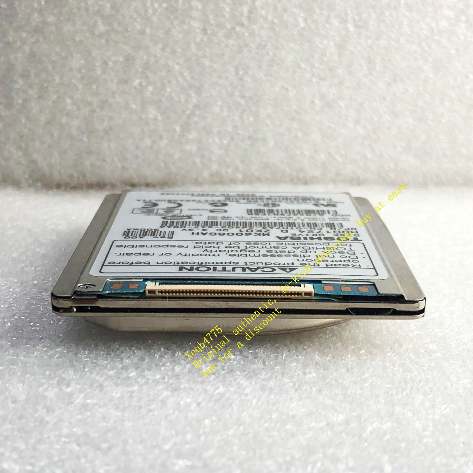 Toshiba 60GB MK6008GAH 1.8-inch hard drive, ATA-100 tested( 7MM thick )