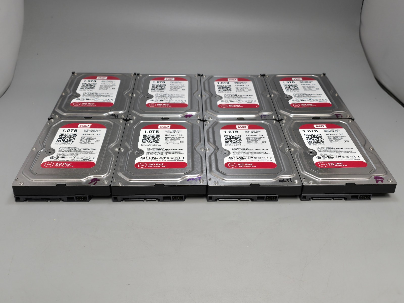 Lot of 8 Western Digital WD Red WD10EFRX 1TB 3.5″ SATA NAS HDD, WIPED, TESTED