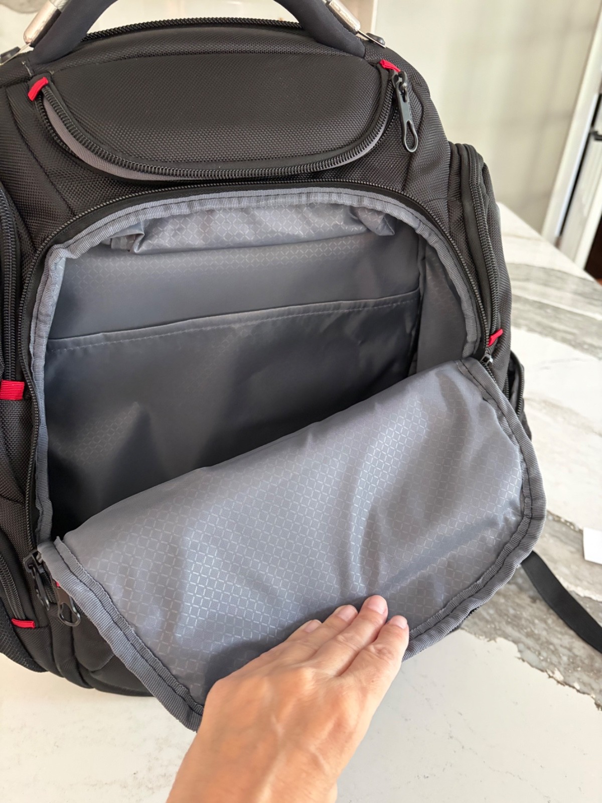 Kroser Black Solid Pattern Laptop Backpack with Padded Laptop Compartment.