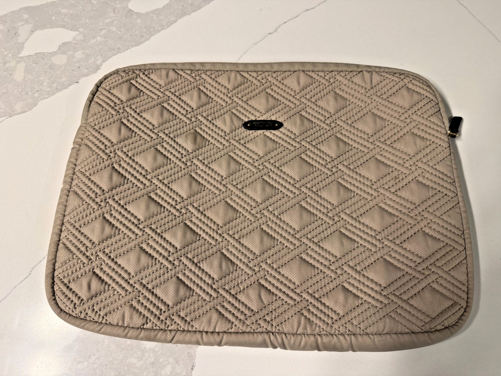 Tumi Beige Quilted Laptop Sleeve, Zipper Closure, lightly used