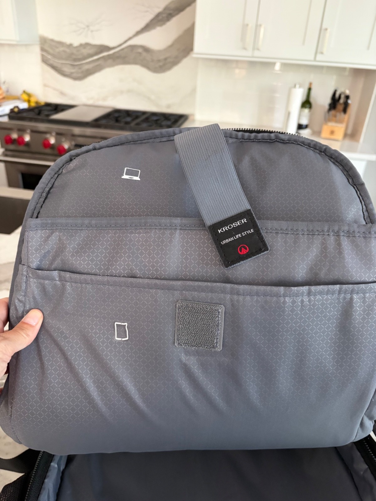 Kroser Black Solid Pattern Laptop Backpack with Padded Laptop Compartment.