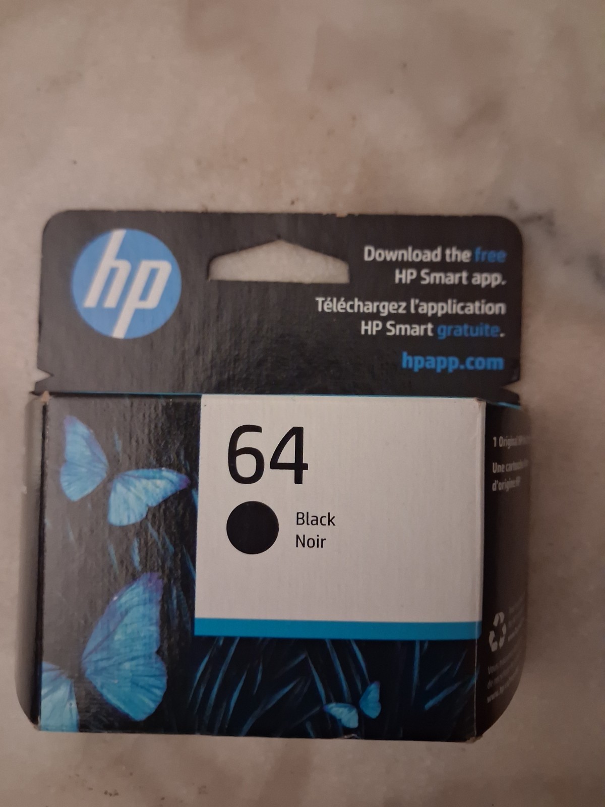This is an HP 64 Black Original Ink Cartridge (N9J90AN).