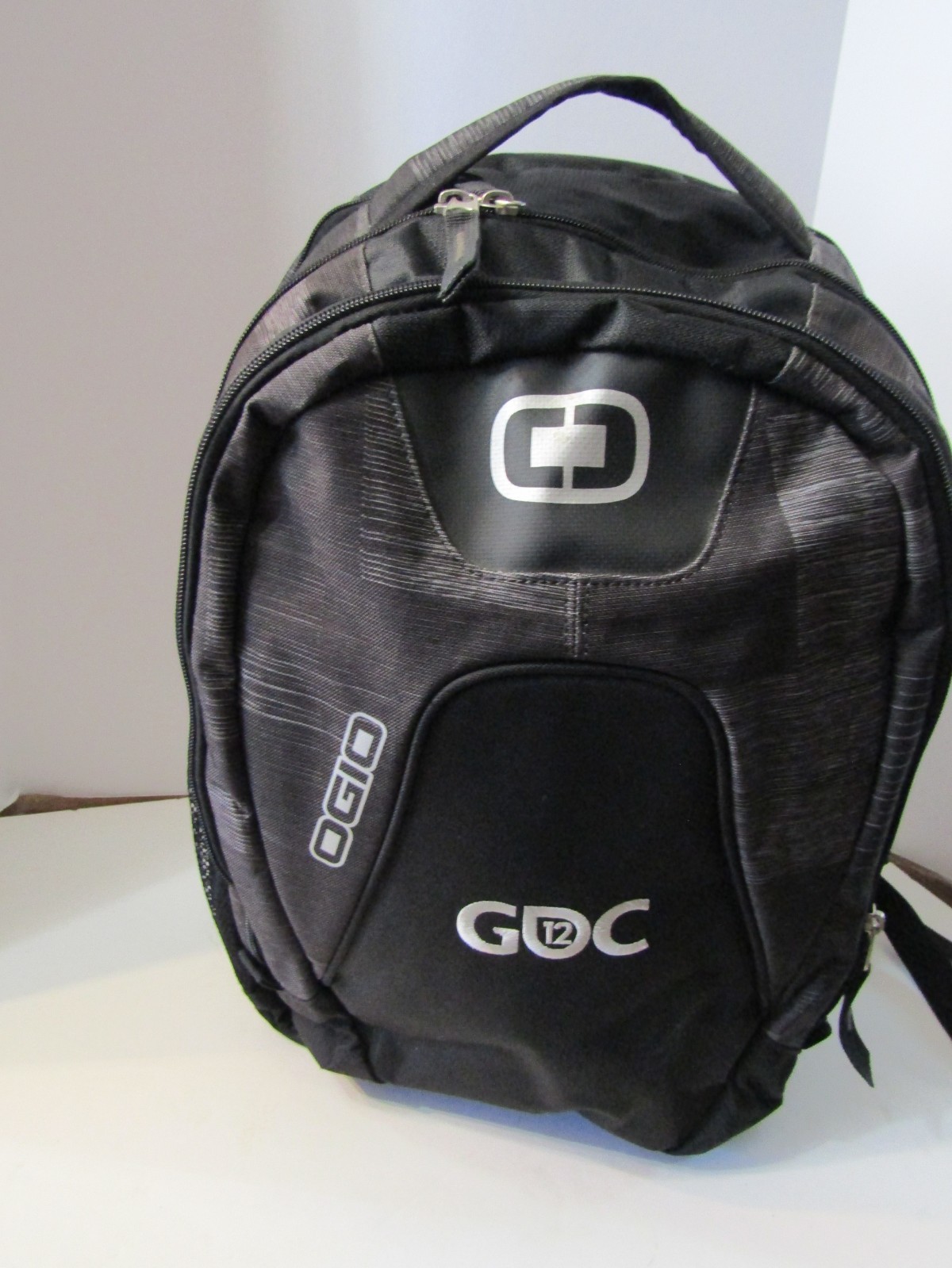 OGIO LAPTOP BACKPACK 3 MAJOR COMPARTMENTS MANY POCKETS THROUGHOUT 13X16