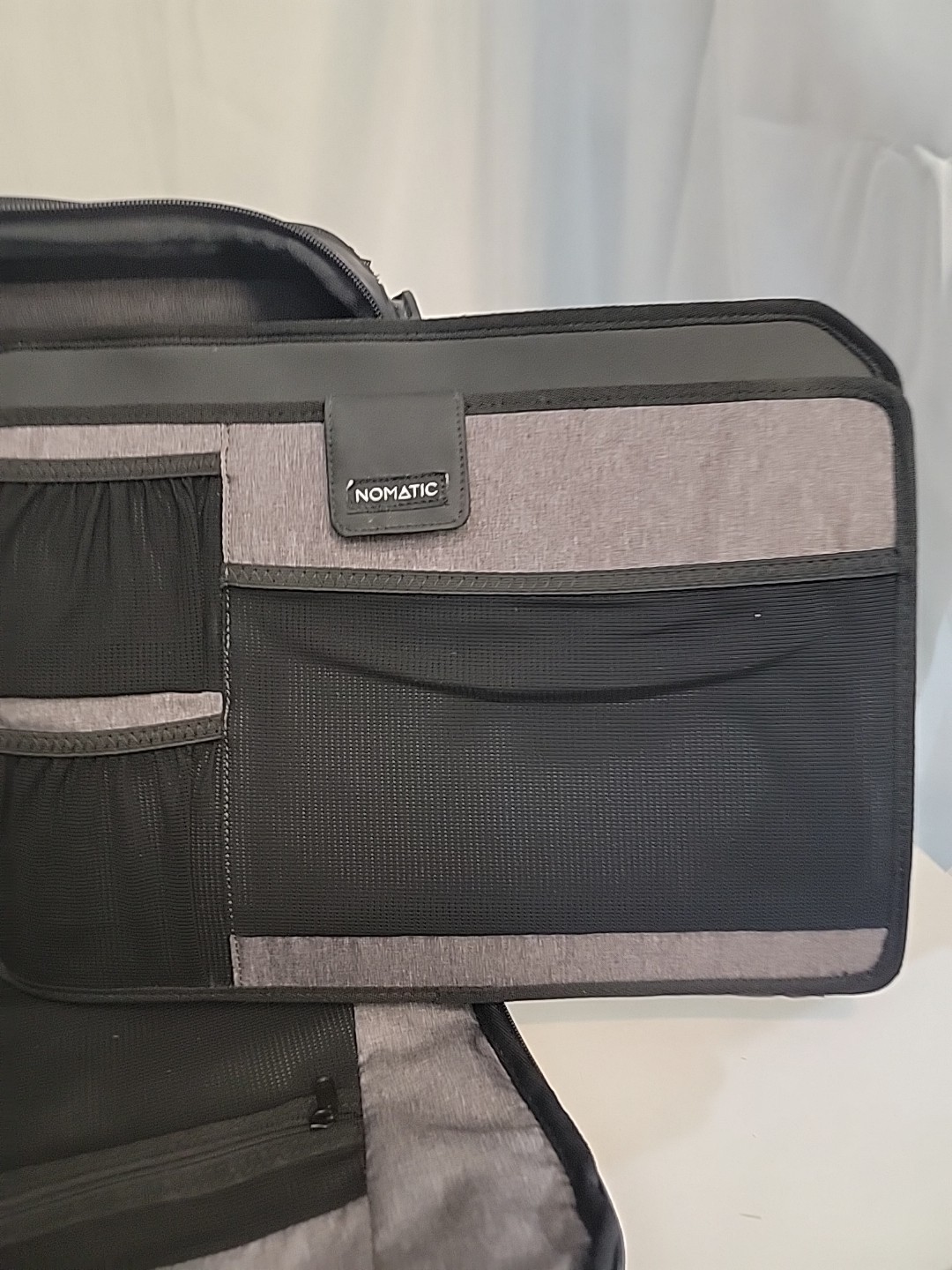 Nomatic Messenger Bag, Magnetic Shoulder Strap, Retails for $299.99