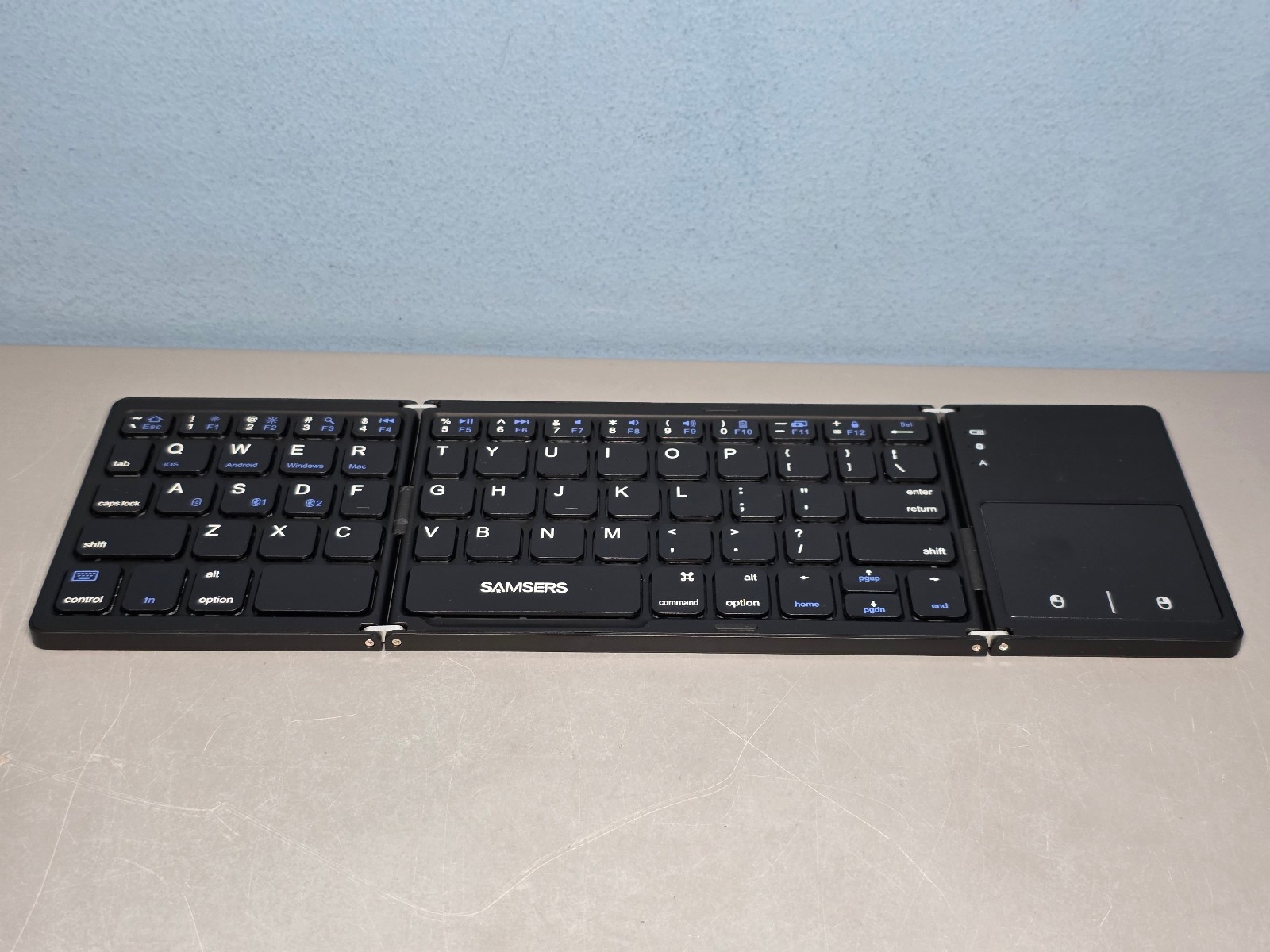 Samsers Foldable Wireless Keyboard with Touchpad & Phone Stand – New!