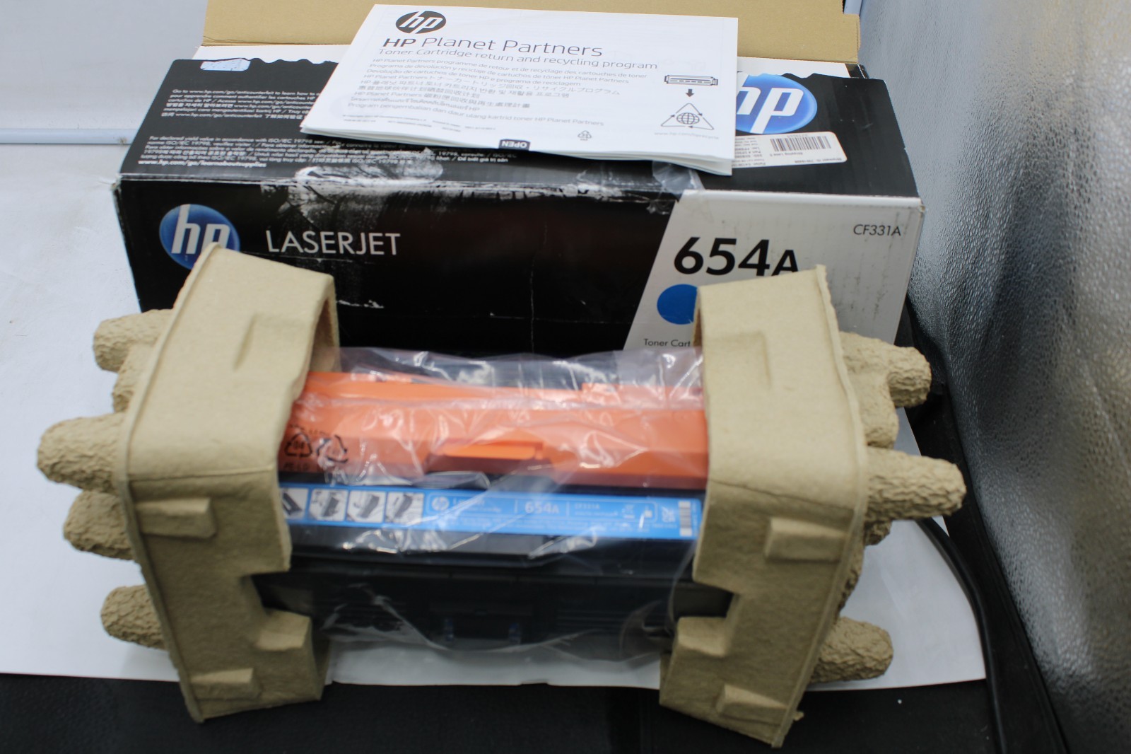 HP 654A LaserJet Cyan Toner Cartridge (CF331A) – NEW SEALED BAG OPEN BOX