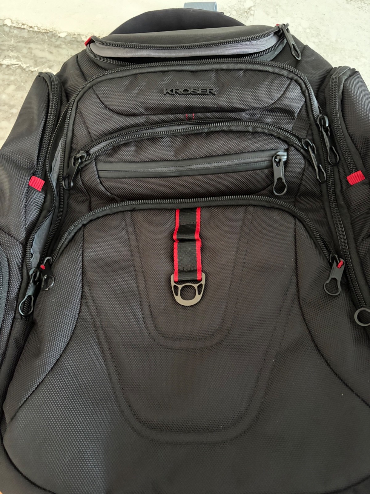 Kroser Black Solid Pattern Laptop Backpack with Padded Laptop Compartment.
