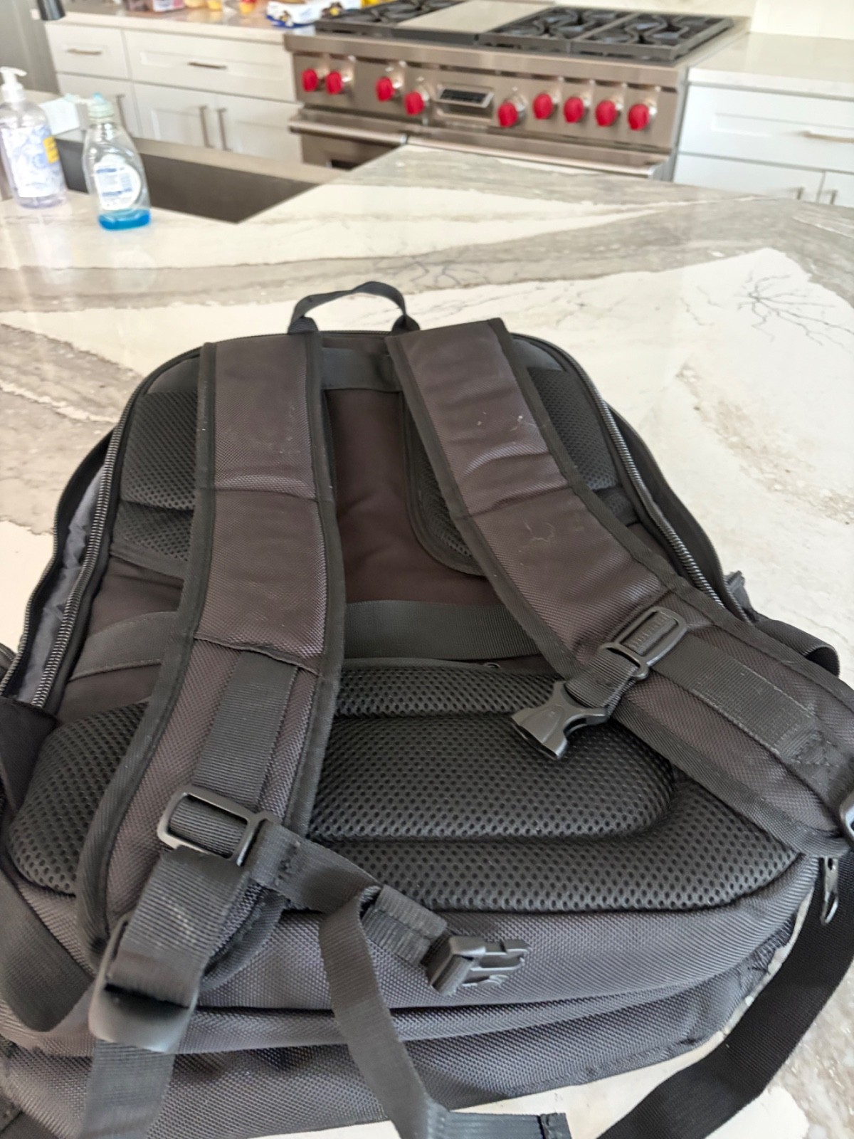 Kroser Black Solid Pattern Laptop Backpack with Padded Laptop Compartment.