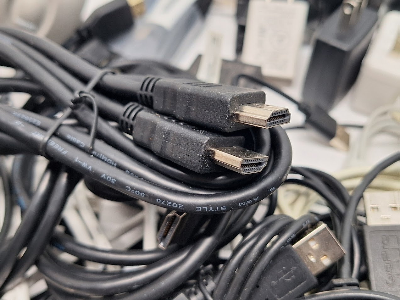 Lot of 60 Assorted Cables and Small Electronics