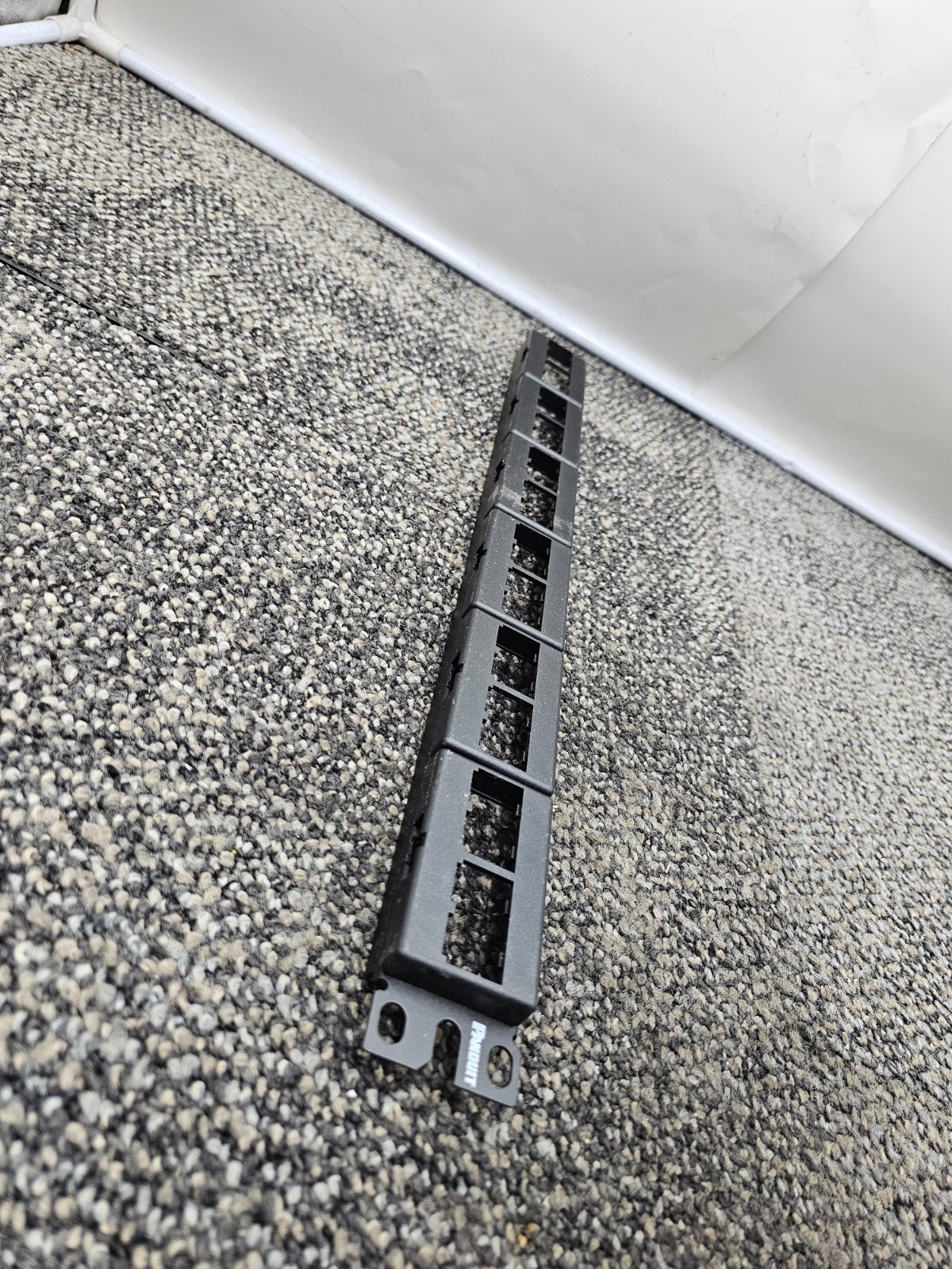PANDUIT CPP24WBLY: 24-Port Mini-Com® Flat Modular Patch Panel, Black